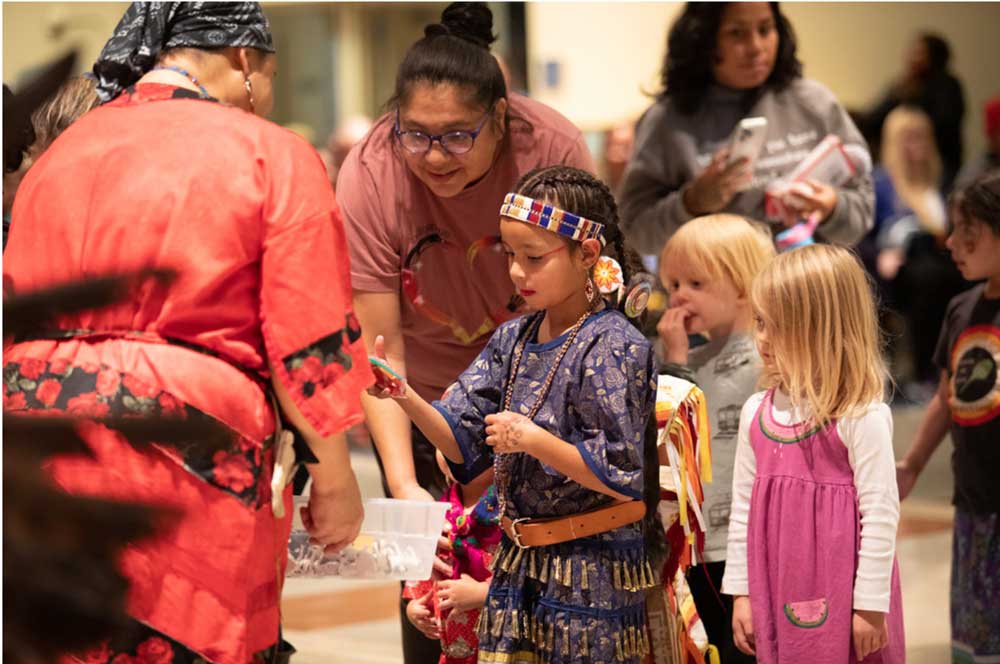 Staff educating the future generation of indigenous cultures