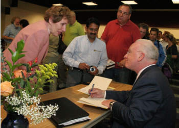 Following his keynote lecture, Clarke met audience members and signed books. 