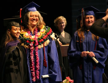 Commencement speaker Heidi Durrow congratulates a member of the Class of 2010