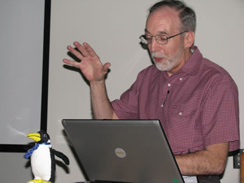 Professor Dick Shamrell lectures as Oswald listens