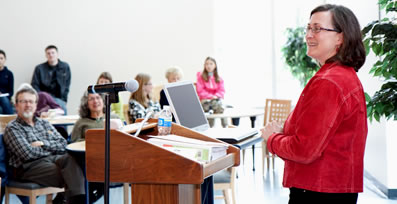 English professor Gail Robinson addresses the audience during her spring 2010 Faculty Speaker Series presentation