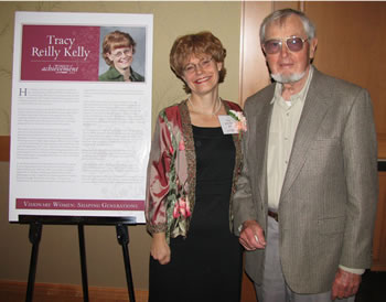 Tracy Reilly Kelly, program manager for Mature Learning and Continuing Education, receives congratulations for being named a 2008 Woman of Achievement.
